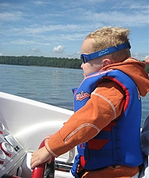 The joy of your first boat ride!!!!!!!!!!  LOL-kyle-driving-rs.jpg