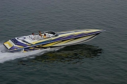 Looking for pics of boats with purple and yellow paint jobs-56327704_1.jpe