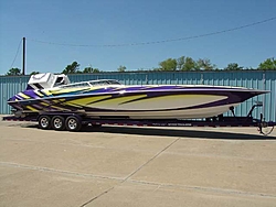 Looking for pics of boats with purple and yellow paint jobs-56327704_2.jpe