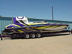 Looking for pics of boats with purple and yellow paint jobs-56327704_3.jpe