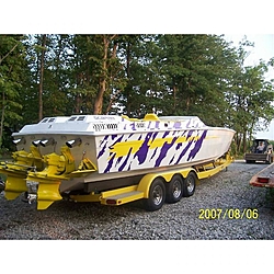 Looking for pics of boats with purple and yellow paint jobs-scarab.jpg