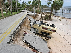 Hurricane aftermath from Stuart FL-car-flipped-off-road.jpg
